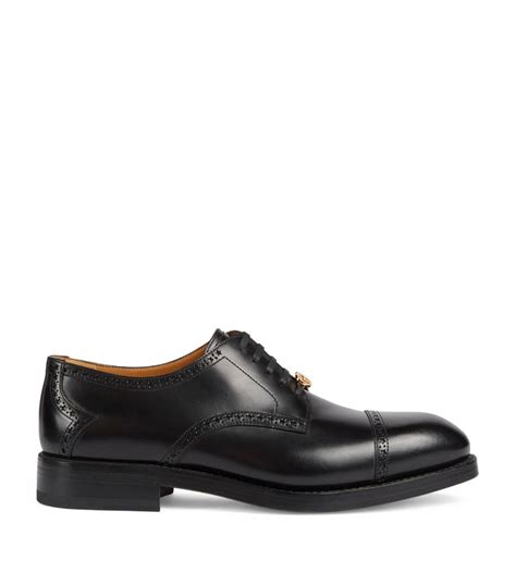 gucci black leather brogues.